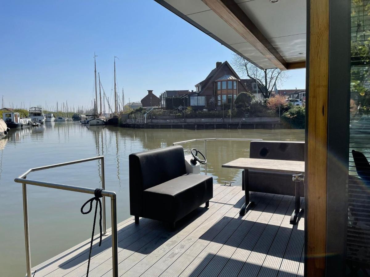 Waterfront Houseboat Near The Centre Hotel โมนนิคเคินดาม ภายนอก รูปภาพ